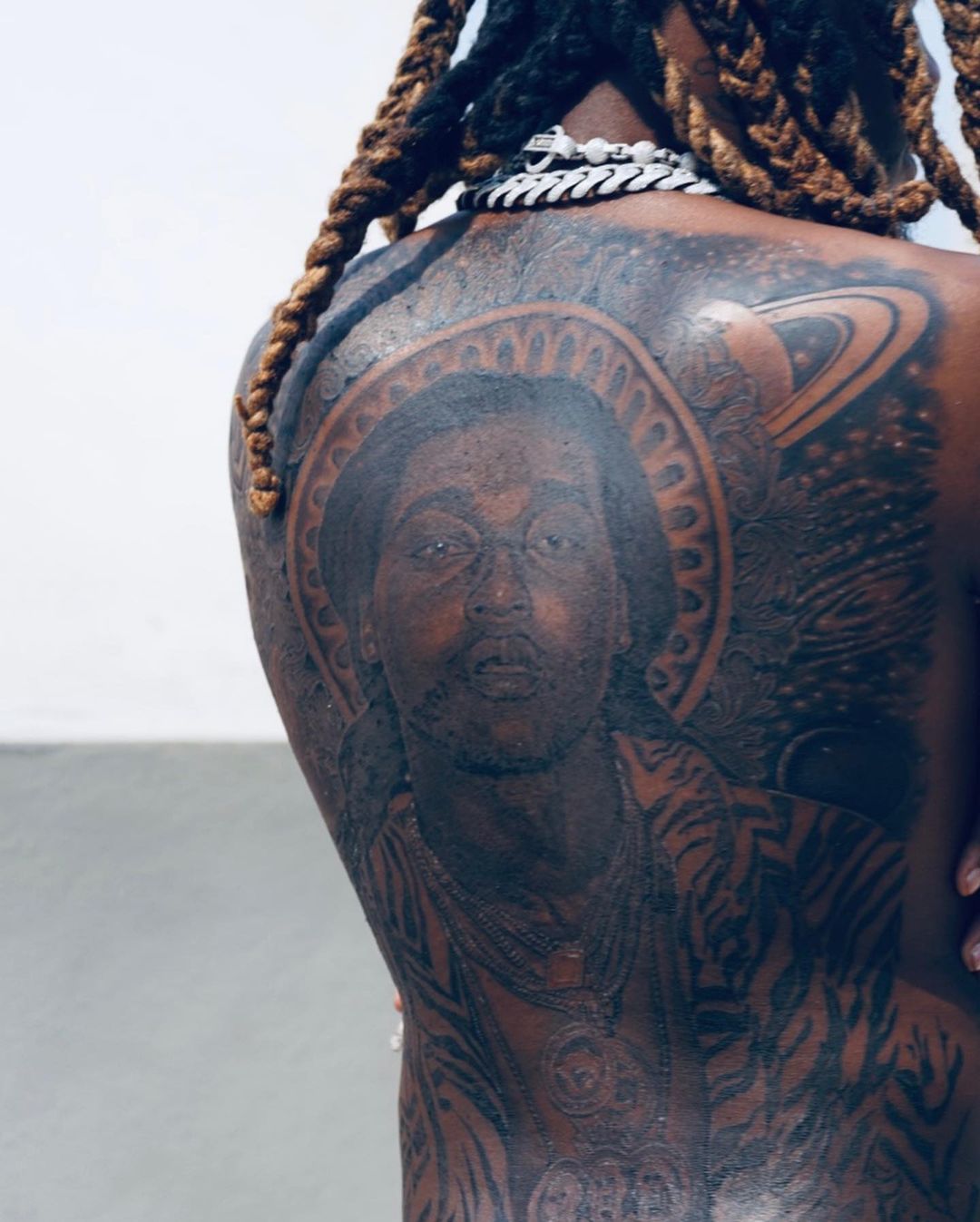 Offsets gets giant tattoo of his Late cousin, Takeoff on his back (Photos)