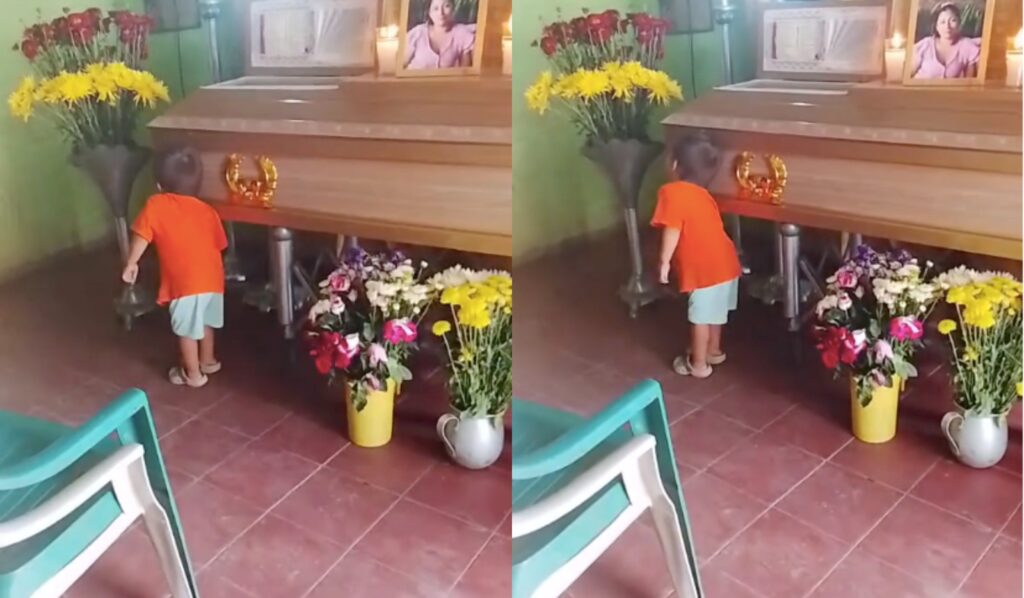Mummy wake up — Emotional moment as little boy stands beside his mother coffin during her funeral